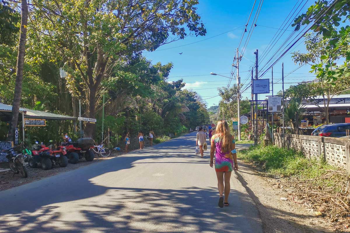 Bailey walks along the main road in Santa Teresa, Costa Rica
