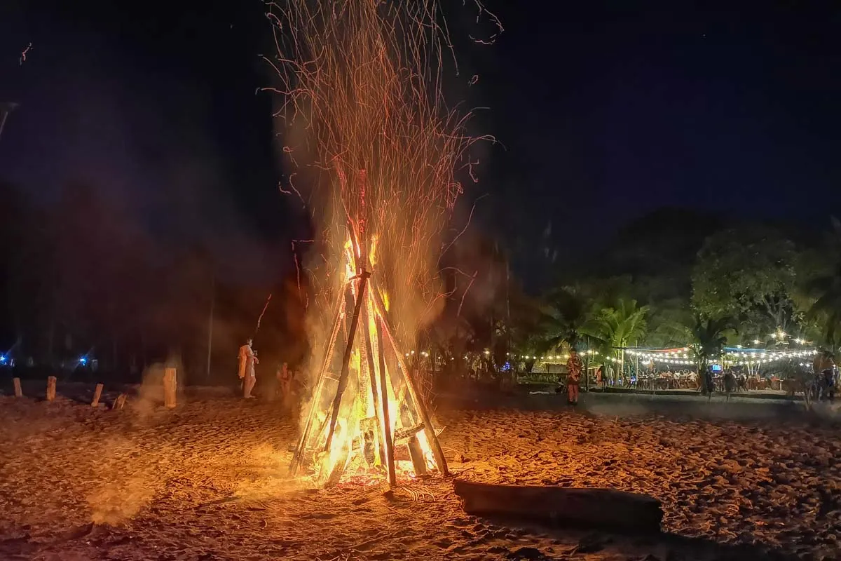 A large bonfire on the beach in Samara, Costa Rica