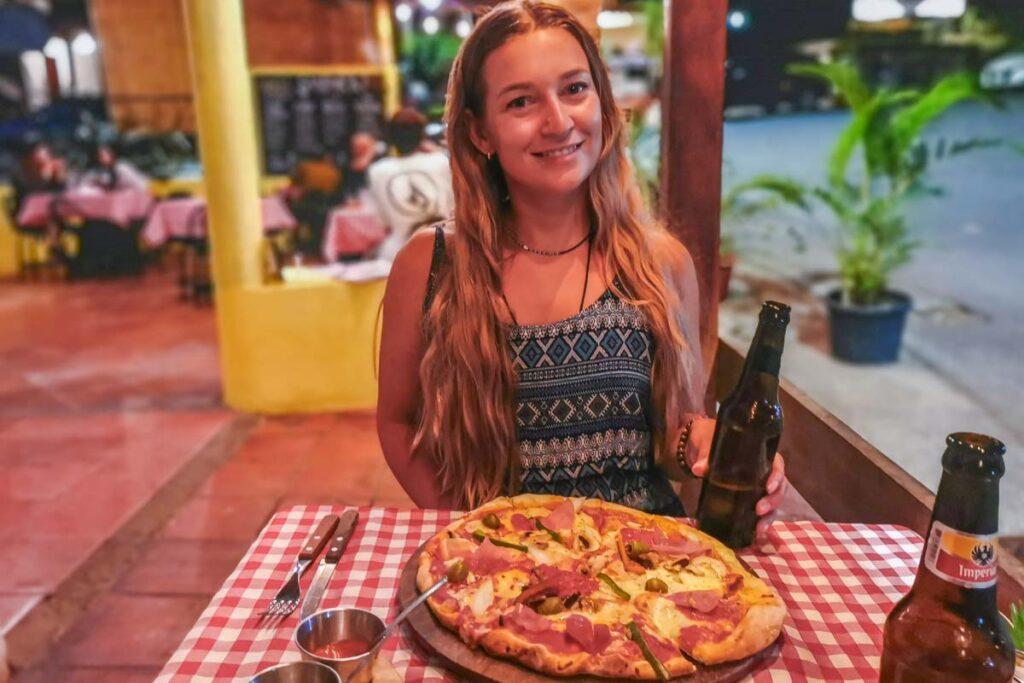 Eating pizza at Pizzeria CHELLO, Montezuma, Costa Rica