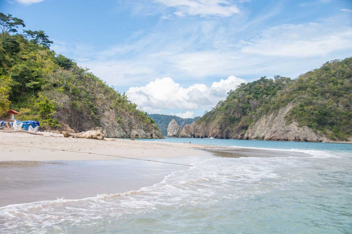 Isla Tortuga Beach on a beautiful day on a tour from Santa Teresa, Costa Rica