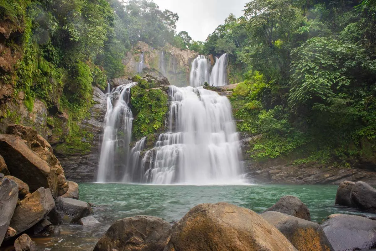 A slow shutter photo of both the Nauyaca Waterfalls in Costa Rica