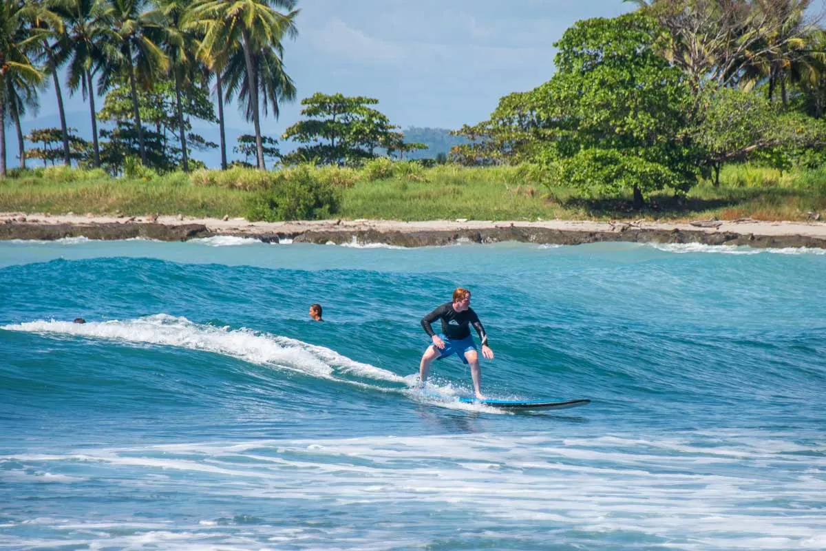 Surfing at a beach near Santa Teresa, Costa Rica