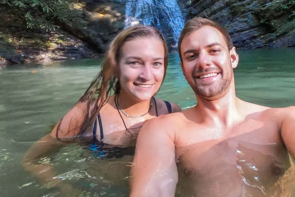 two people take a selfie at Mala Noche Waterfall, Nosara, Costa Rica