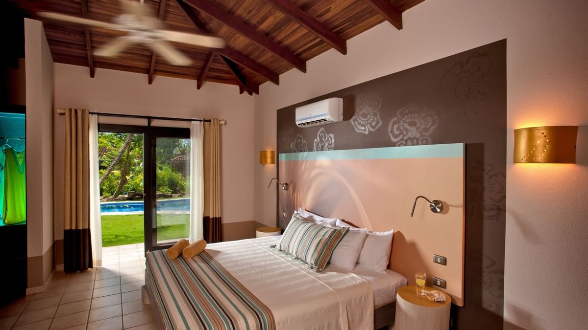 the inside of a room with a pool view at Cala Luna Boutique Hotel & Villas