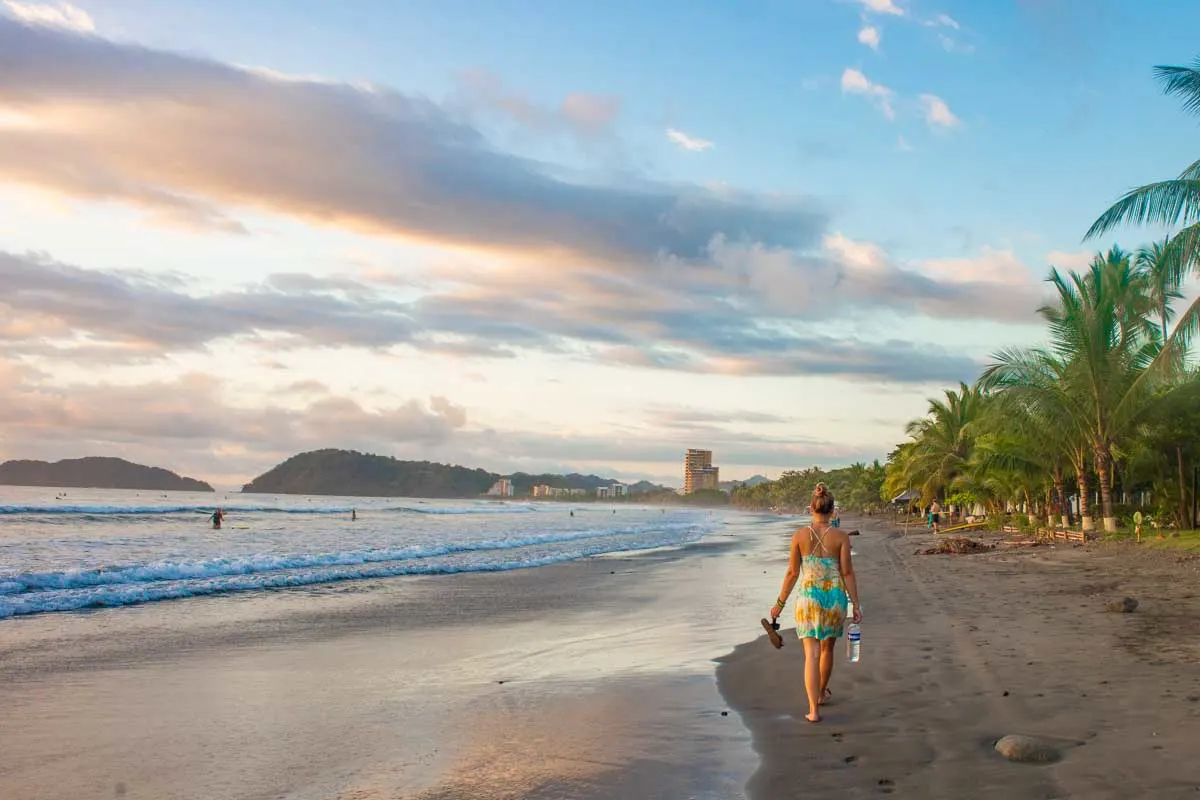 Lady Walks Along Jaco Beach Costa Rica .webp