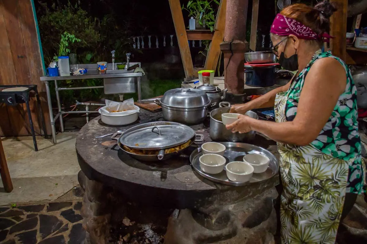 A local Costa Rican woman cooks on a cooking class