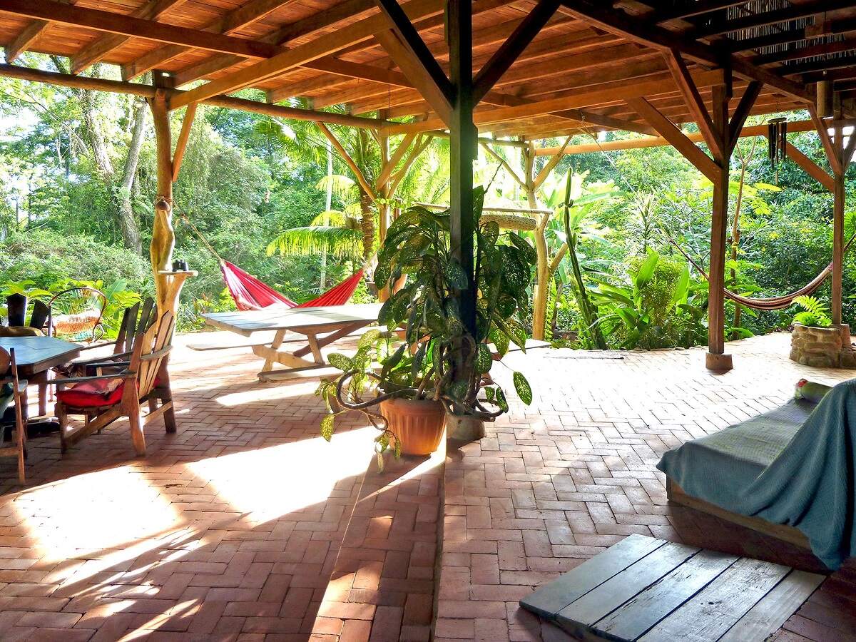 the patio in the jungl eat Cascada Verde Hostel