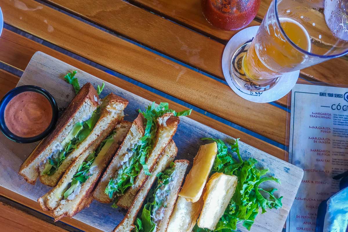 A sandwich and beer at Fuego Brew Co in Dominical, Costa Rica
