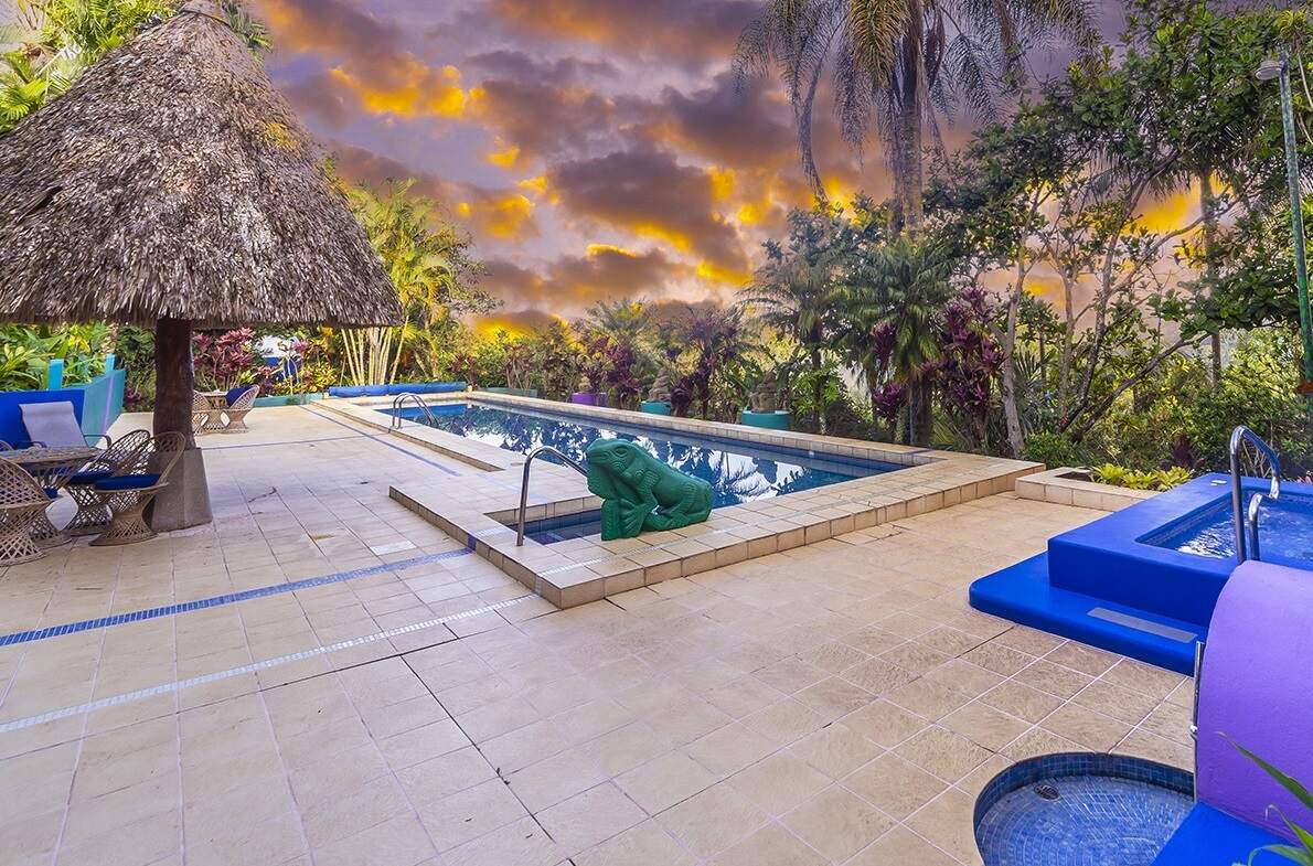 two pools at sunset at Xandari Resort & Spa