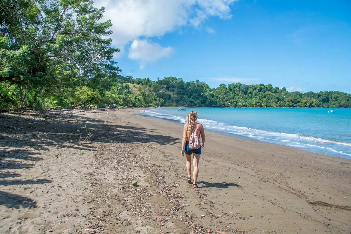 Bailey walks along Playa Colorada in Drake Bay, Costa Rica