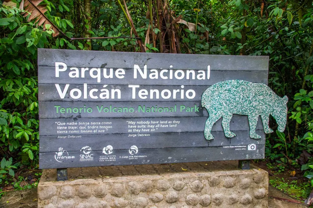 A sign of Tenorio National Park inside Rio Celeste