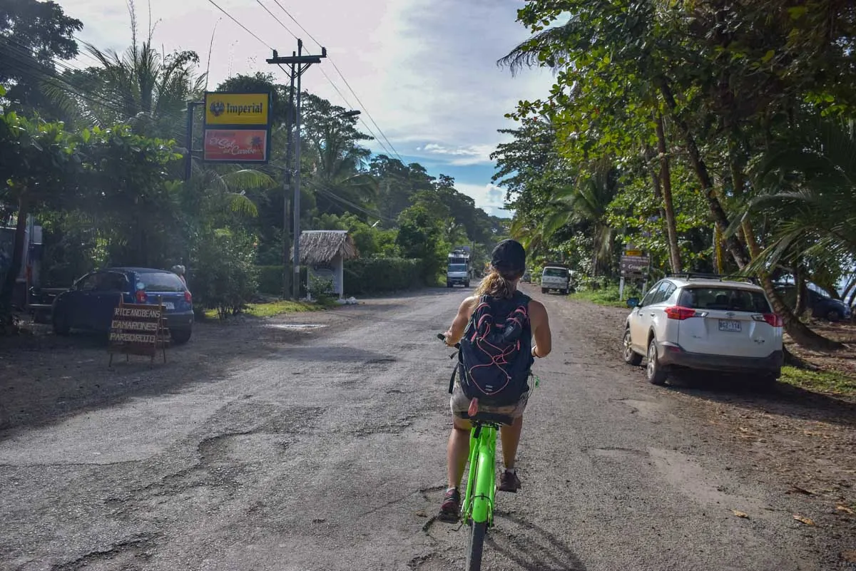 Bailey rides a bike around Puerto Viejo, Costa Rica