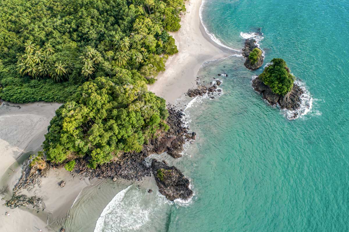 Arial shot of Manuel Antonio National Park beach and rock formations