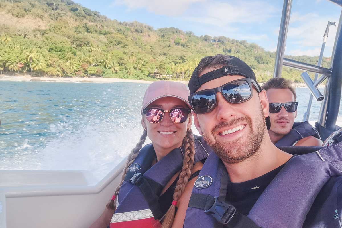 Daniel and Bailey take a selfie on the boat to Tortuga Island