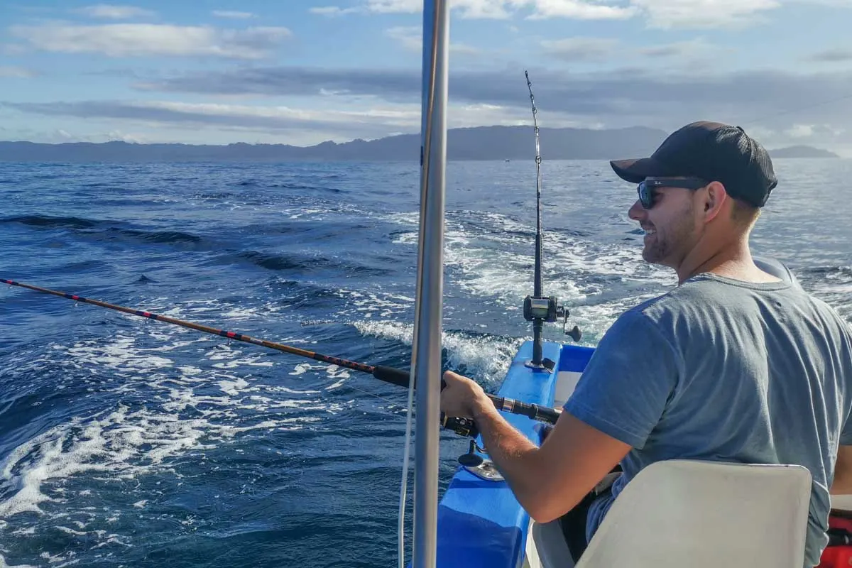 Daniel fishing in Paquera, Costa Rica