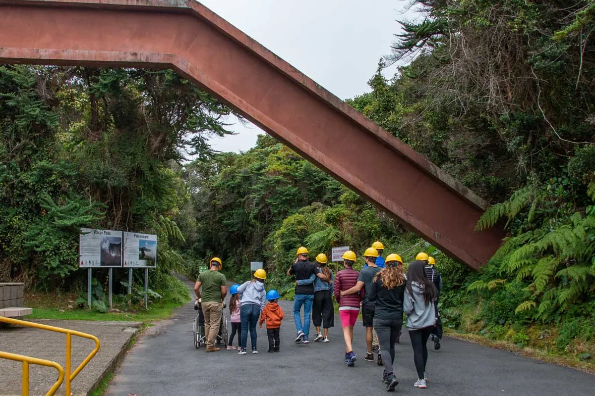 People walk to Poas Viewpoint from the visitor center