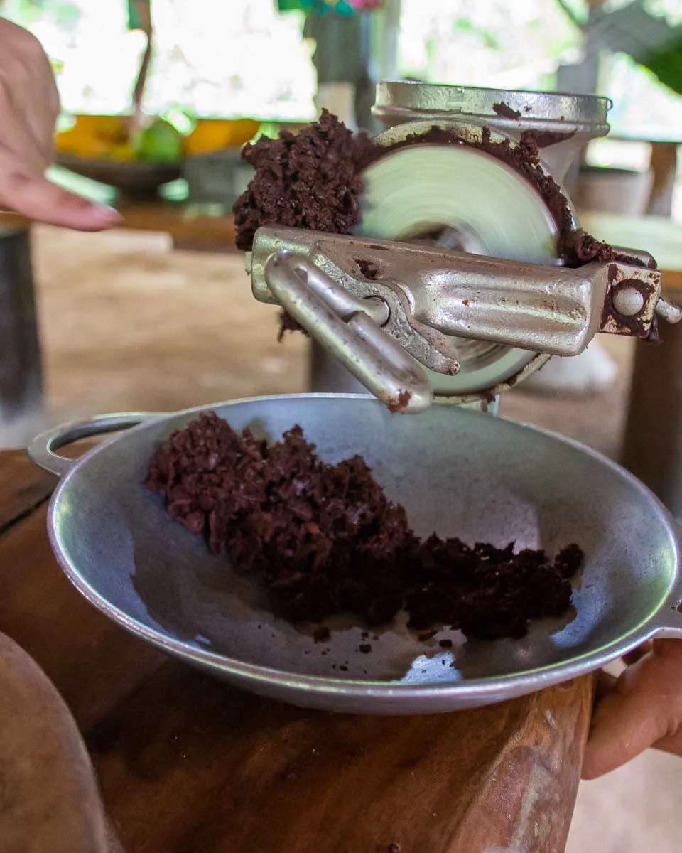Making chocolate on a tour at Rancho Raices de Osa