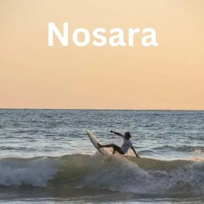 A man surfs in Nosara