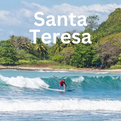 A person surfs in Santa Teresa, Costa Rica