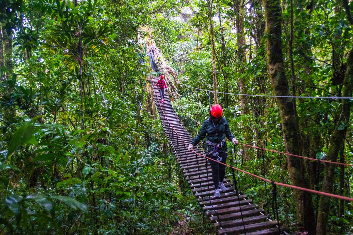 adventures crossing the hanging bridge at 100% Aventura in Monteverde, Costa Rica