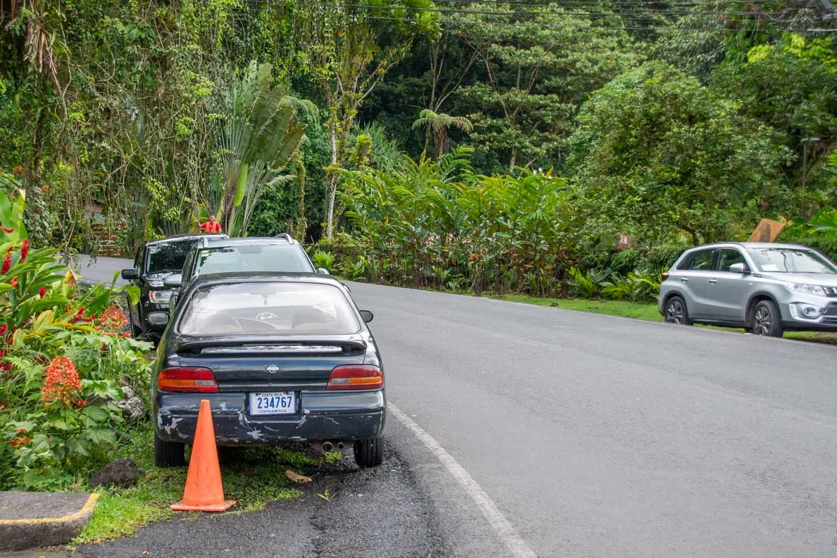 Cars parked legally on the side of the road in Costa Rica