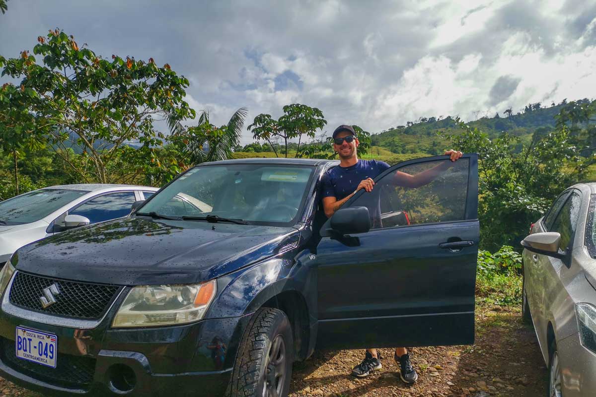 Daniel with his rental car he was driving around Costa Rica