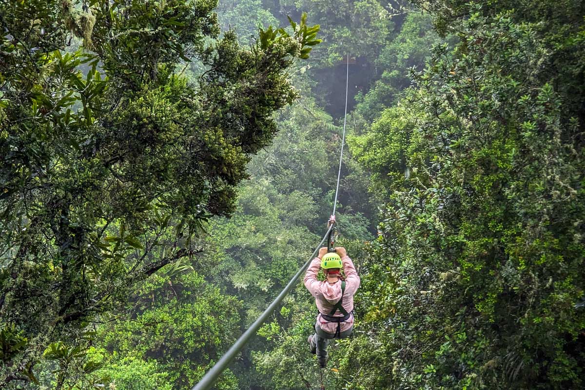 Bailey zooms down a zipline in Costa ricas jungle