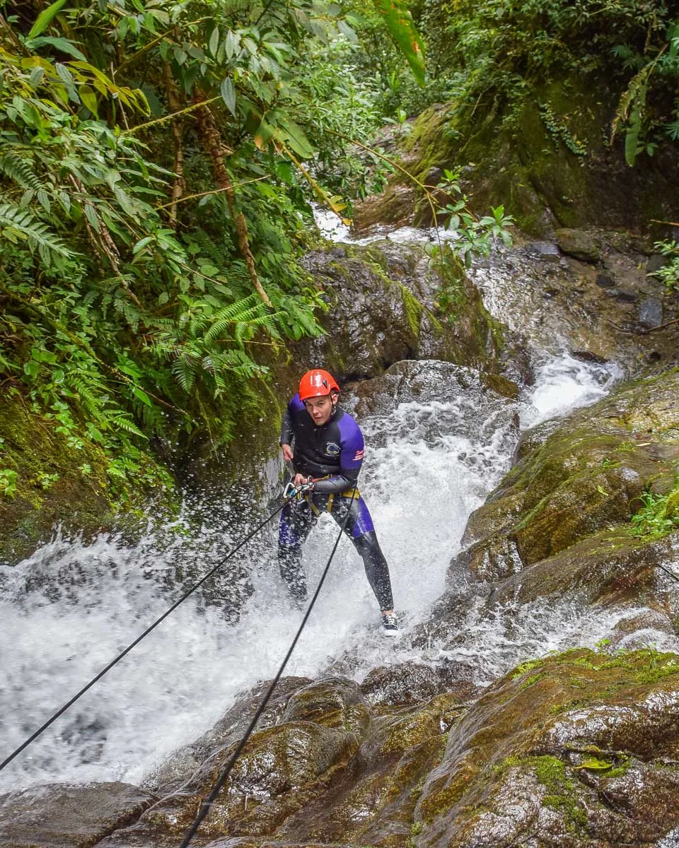 Repelling down a waterfall in Costa Rica on a canyoning tou