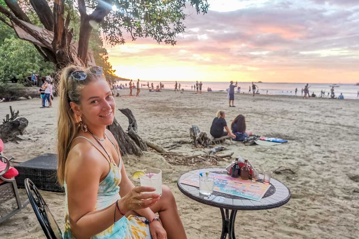 Bailey relaxes with a drink on Tamarindo Beach, Costa Rica