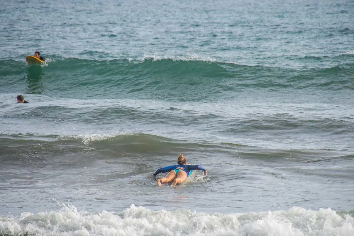 Bailey surfs in tamarindo, Costa Rica