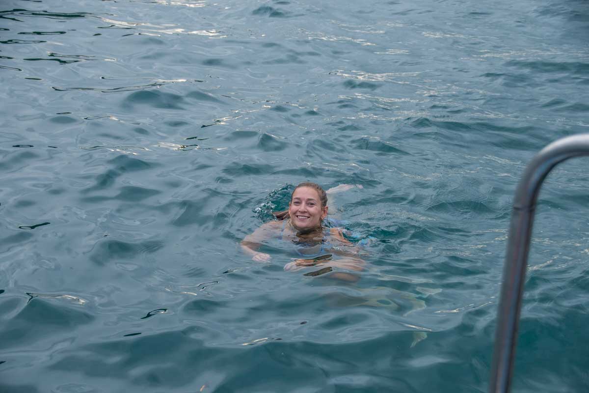 Bailey swims on a sunset cruise in Tamarindo