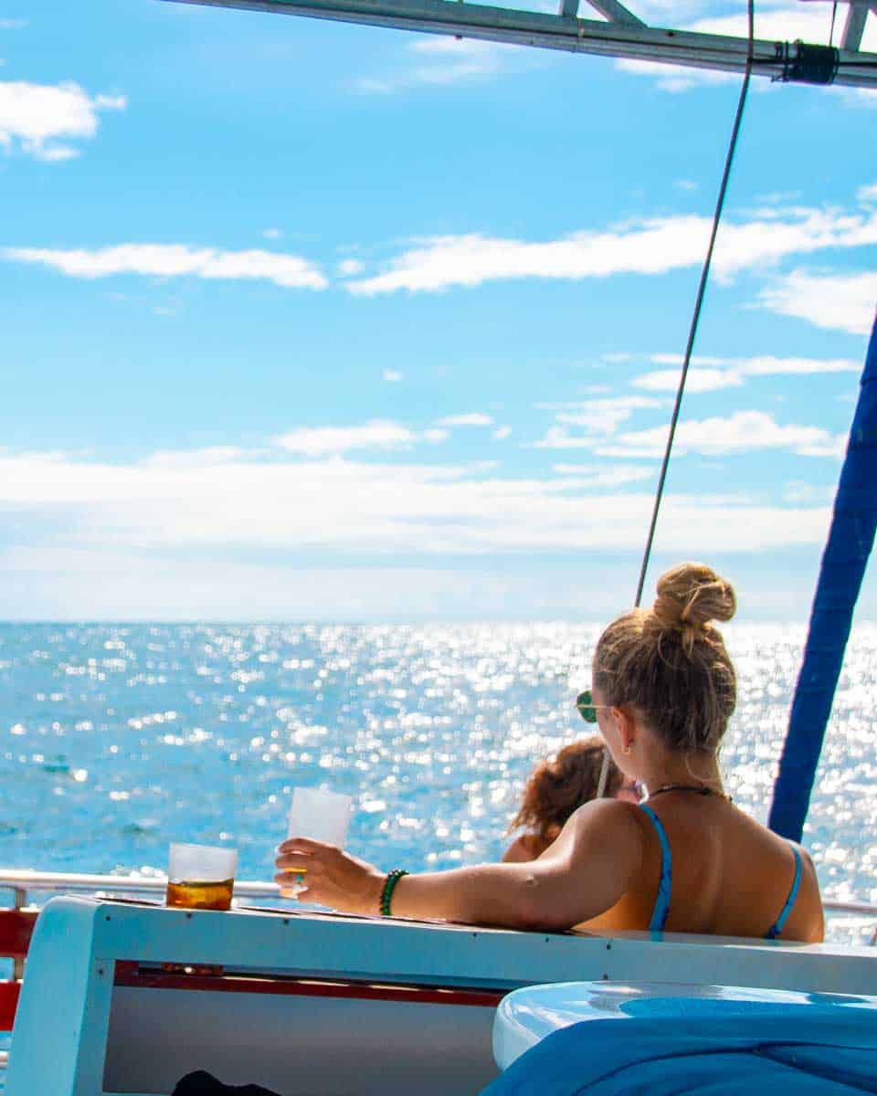 Bailey on a catamaran drinking cocktails in Manuel Antonio Costa Rica