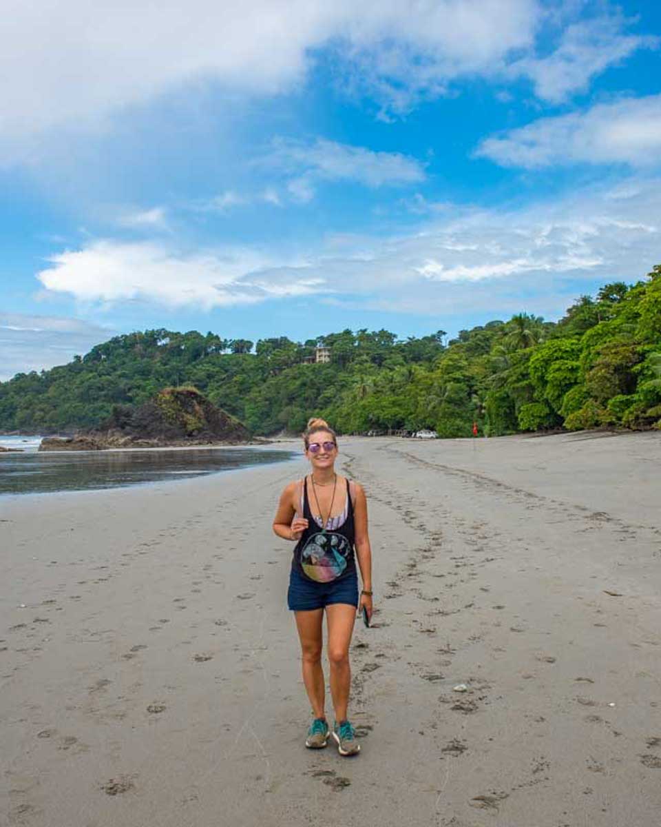 A-lady-walks-along-North-Espadilla-Beach-Manuel-Antonio