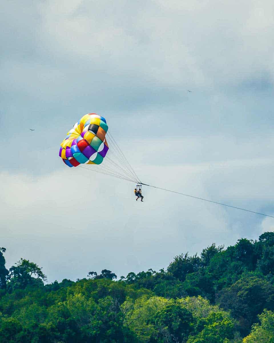 Two people parasailing on Espadilla Beach Manuel Antonio Costa Rica