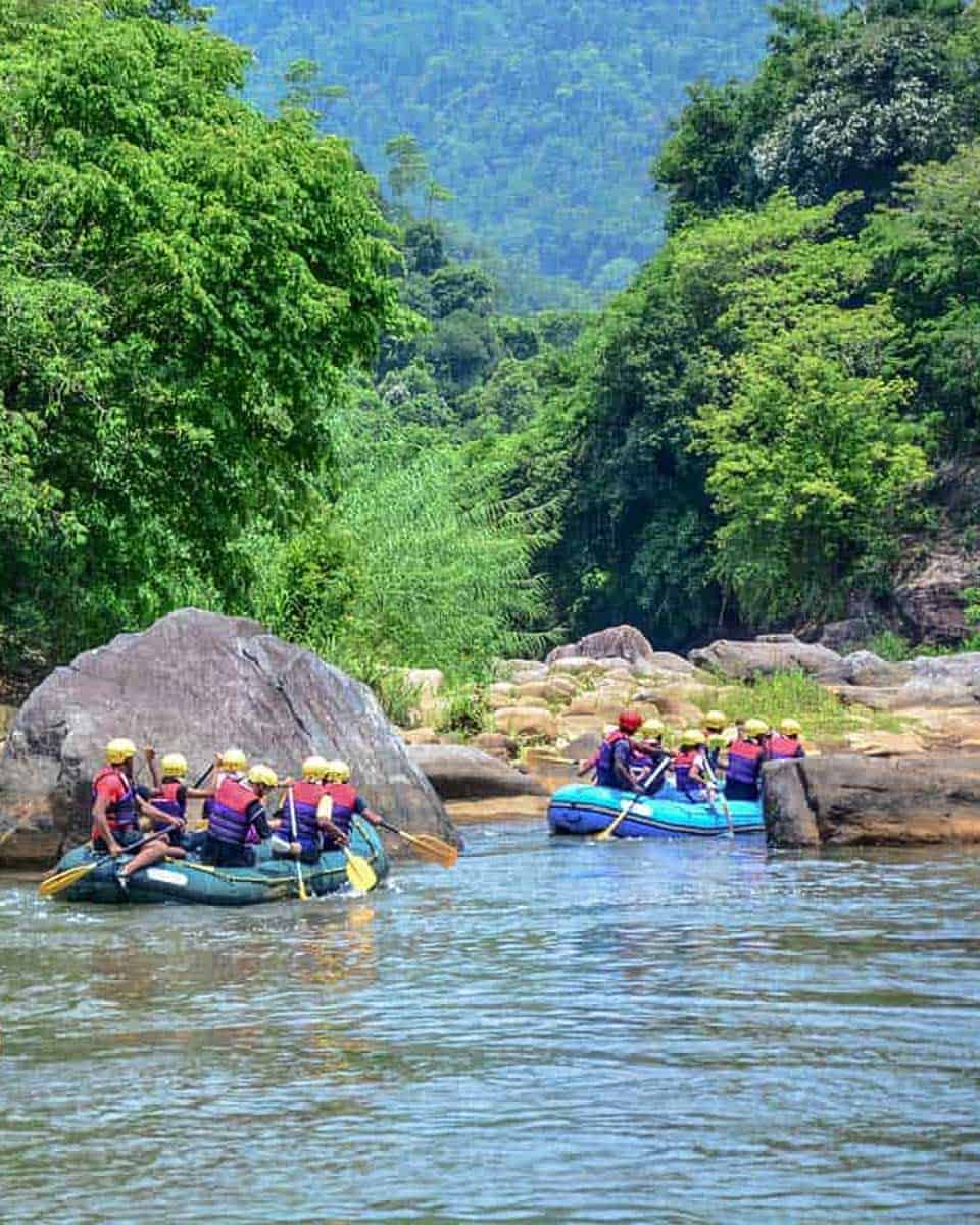Two-rafts-float-down-a-river-in-La-Fortuna